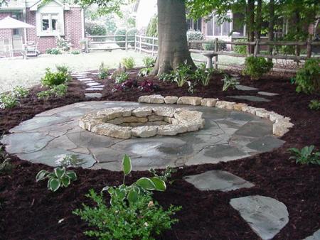 Flagstone Patio Around Natural Stone Fire Pit Progressive